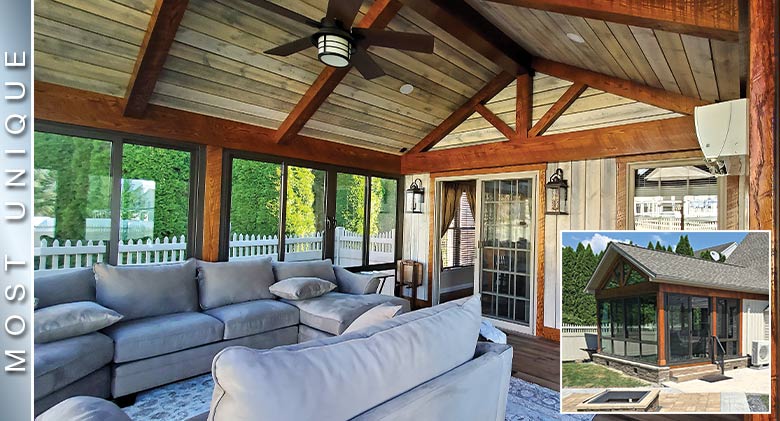 BEST INTERIOR: A comfortable sectional seating area inside a brown patio enclosure with pillows, coffee table & ceiling fan.