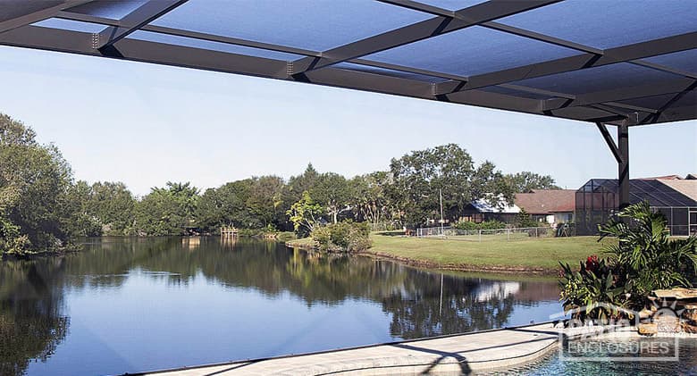 The interior of a screened pool enclosure in dark brown with a 