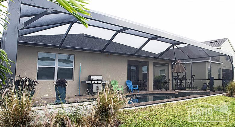 Screened pool enclosure with extreme view in bronze.